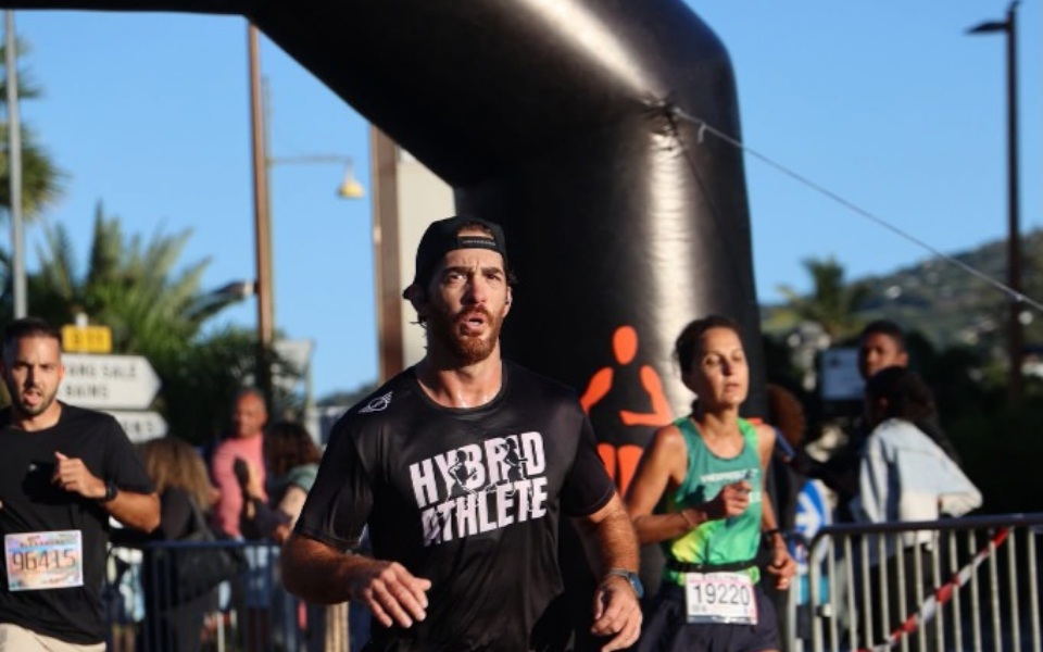 Coach Didier competing in race - Hybrid Athlete
